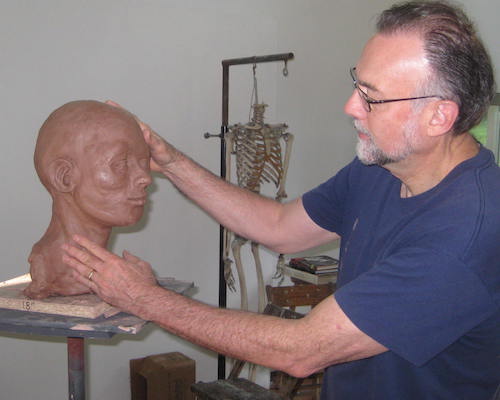 Dr. Donn Chatham with one of his artistic sculptures